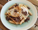 Foto del paso 4 de la receta: Huevos rotos con carrilleras
