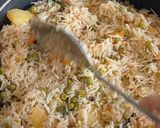A picture of step 5 of Aloo, matar, polaw.