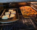 A picture of step 4 of Easy stuffed shells (pasta bake) spinach mushrooms and ricotta cheese.