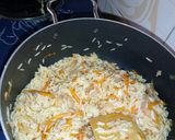 A picture of step 4 of Carrot rice.