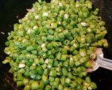 A picture of step 3 of Beans Poriyal stir fry.