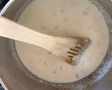 A picture of step 7 of Anti Vampire Cheese Sauce, with Onions and Garlic.