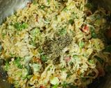 A picture of step 4 of Cheesy Maggi vegetable cake.