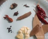 A picture of step 1 of Black vatana pulao.