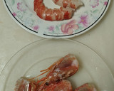 Foto del paso 1 de la receta: Lubina con gambas y almejas en salsa