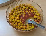 A picture of step 6 of Karonda pickle.