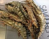 Une image de l'étape 1 de Gambas sauvages à la tomate, câpres et aneth.