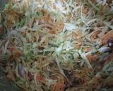 A picture of step 16 of Tumeric rice with sausages, egg curry and salad.