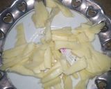 A picture of step 8 of Egg cheese roll.