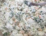 A picture of step 7 of Creamy spring onion prawns with parsley rice.