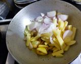 A picture of step 2 of Potato Onion Sabzi.