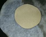 A picture of step 10 of Ashtami special prasaad the puri chana and halwa thali.