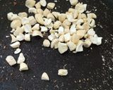 A picture of step 2 of Pumpkin seeds chikki.