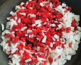 Foto del paso 3 de la receta: Morrones rellenos de pollo y arroz