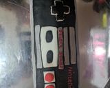 A picture of step 10 of Nes controller cake.