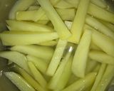 A picture of step 3 of Tawa masala fries.