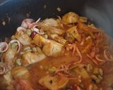 Foto del paso 4 de la receta Guiso de patatas con calamar, alcachofas y habitas tiernas