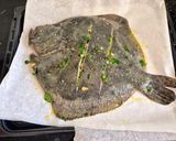 A picture of step 2 of Roasted Turbot Stuffed with Fresh Herbs and Lemon.