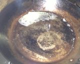A picture of step 3 of Grilled Okaka Onigiri (Rice Balls with Bonito Flakes).