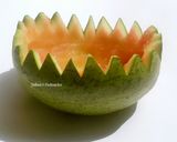 A picture of step 1 of Fruits Salad Canoe.