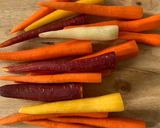 A picture of step 2 of Roasted Carrots with Thyme, Oregano, and Parsley.
