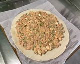 Une image de l'étape 10 de Tourte au porc, petits pois, crème et feta.