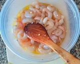 Foto del paso 1 de la receta Gambas al fish masala con patatas confitadas en fumet de gambas
