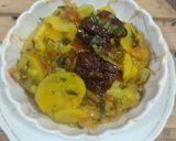 A picture of step 5 of Potato with spring onion.