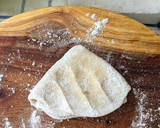 A picture of step 3 of Layered Chapatis with tea.