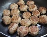 A picture of step 4 of Tender Cabbage and Meatball Tomato Stew.