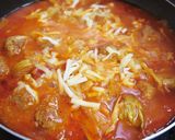 A picture of step 10 of Tender Cabbage and Meatball Tomato Stew.
