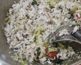A picture of step 3 of Atukulu with coconut and cucumber in south style.