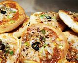 A picture of step 3 of Person Tikka pizza.
