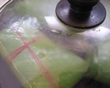 A picture of step 7 of Bhetki machher paturi/ Barramundi cooked in banana leaves.