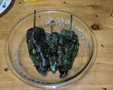 A picture of step 4 of Roasted Poblano Peppers with Chicken & Queso Cheese Sauce.