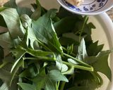 A picture of step 1 of Sweet Potato Leaves Sautéed with Garlic.