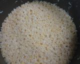 A picture of step 2 of Moong dal dalia broken weat.