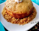 A picture of step 8 of Urad dal jaggery cake baked poda pitha.