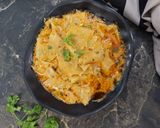 A picture of step 9 of Rajasthani Papad Curry.