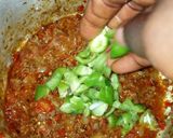 A picture of step 12 of Nigerian carrot fried rice with minced meat soup.