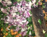 A picture of step 2 of Stir fried rice, chicken stew and fried plantain.