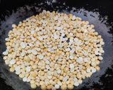 A picture of step 1 of Peanuts and fried gram Burfi.