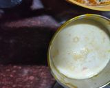 A picture of step 2 of Mango malpua with fresh cream.