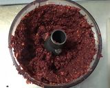 Une image de l'étape 8 de Dahl de lentilles jaunes aux carottes violettes, tomates et courgette.