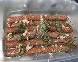 Une image de l'étape 5 de Maxi chipolatas marinées grillées ail et romarin.