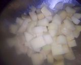 A picture of step 1 of ALU gajar matar meithe,.