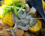 Foto langkah ke 4 dari resep Rebusan Jagung Saus Tiram.
