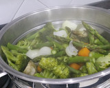 Foto del paso 4 de la receta: Verduras al vapor con pechuga de pavo