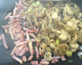 Foto del paso 7 de la receta: Espaguetis con salsa de puerro y champiñón 