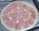Foto del paso 3 de la receta: Hojaldre de jamón, emmental, queso de cabra y tomates cherry